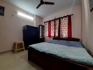 Bedroom in 2 BHK Apartment at Satellite Garden, Goregaon East – for Rent