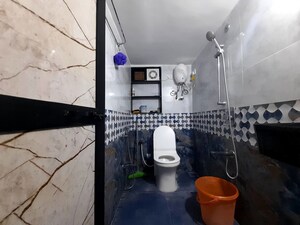 Bathroom in 2 BHK Apartment at Satellite Garden, Goregaon East – for Rent