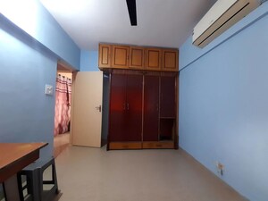 Room in 2 BHK Apartment at Satellite Garden, Goregaon East – for Rent
