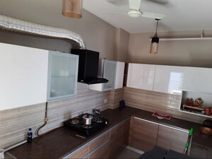 Kitchen in 3 BHK Apartment at ABA Cleo County, Sector 121 – for Rent