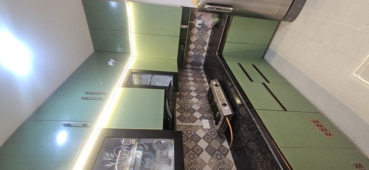 Kitchen, signature-global-the-millennia 2 Bedroom 685 Sq.Ft. Apartment In Sector 37d Gurgaon 10586274