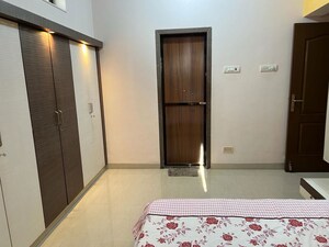 Bedroom in 2 BHK Apartment at K Raheja Heights, Malad East – for Rent