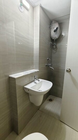 Bathroom in 1.5 BHK Apartment at Runwal Gardens Phase I, Dombivli East – for Rent