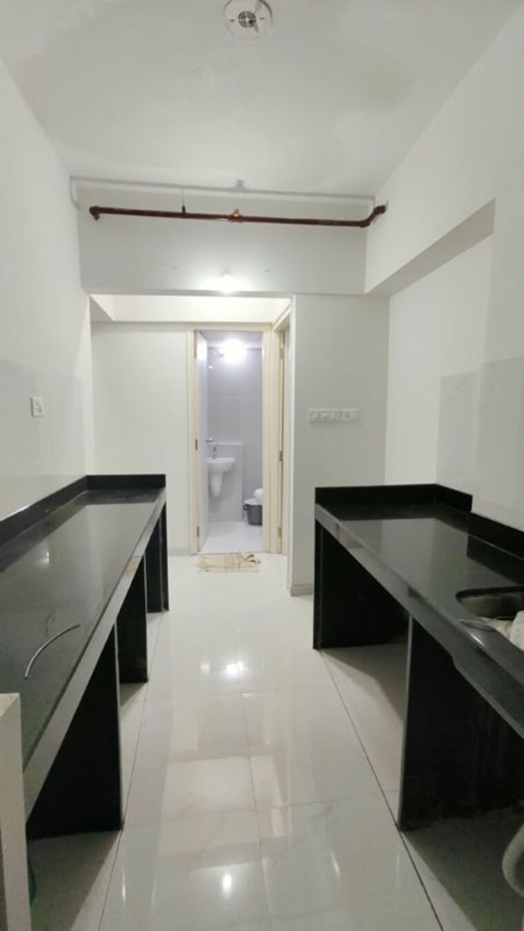 Kitchen, runwal-gardens-phase-i 1.5 Bedroom 554 Sq.Ft. Apartment In Dombivli East Thane 10586433