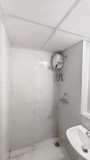 Bathroom in 1.5 BHK Apartment at Runwal Gardens Phase I, Dombivli East – for Rent
