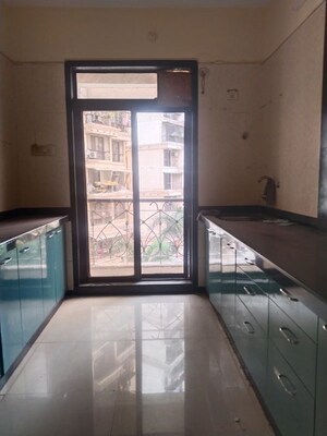 Kitchen in 2 BHK Apartment at Hyde Park CHS, Kharghar – for Rent