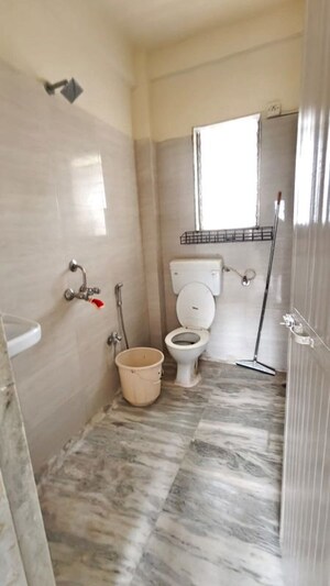 Bathroom in 3 BHK Apartment at Doordarshan CHS, Goregaon East – for Rent