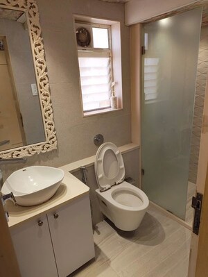 Bathroom in 2 BHK Apartment at Hiranandani Garden Brentwood, Powai – for Rent