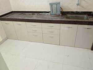 Kitchen in 2 BHK Apartment at Avishkar Primero, Undri – for Rent