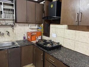 Kitchen in 3 BHK Builder Floor at Kalkaji – for Sale