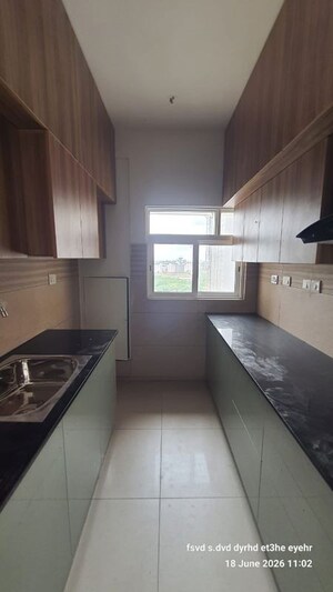 Kitchen in 2 BHK Apartment at Signature Global Orchard Avenue, Sector 93 – for Rent