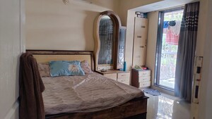 Bedroom in 2 BHK Apartment at Tharwani Heritage, Kharghar Sector 7 – for Rent