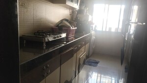 Kitchen in 2 BHK Apartment at Tharwani Heritage, Kharghar Sector 7 – for Rent