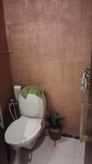 Bathroom in 2 BHK Apartment at Reflex Satnam Apartment, Cuffe Parade – for Rent