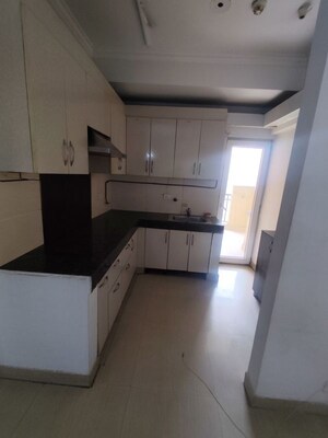 Kitchen in 2 BHK Apartment at Paramount Floraville, Sector 137 – for Sale