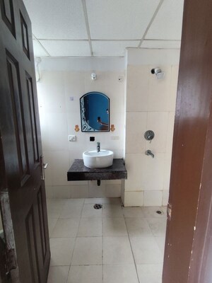 Bathroom in 2 BHK Apartment at Paramount Floraville, Sector 137 – for Sale