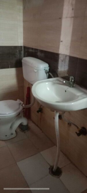 Bathroom in 3 BHK Apartment at Oxirich Avenue, Ahinsa Khand 2 – for Sale