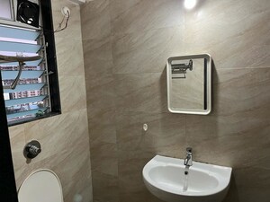 Bathroom in 1 BHK Apartment at Rajhem JVLR 60, Andheri East – for Rent