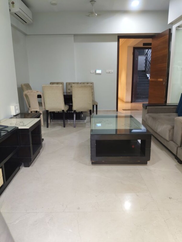 Living Room, transcon-triumph-tower 2 Bedroom 864 Sq.Ft. Apartment In Andheri West Mumbai 10586895