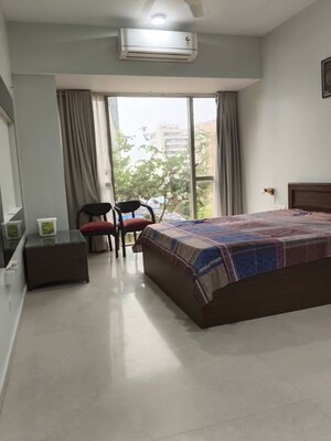 Bedroom in 2 BHK Apartment at Transcon Triumph Tower, Andheri West – for Sale