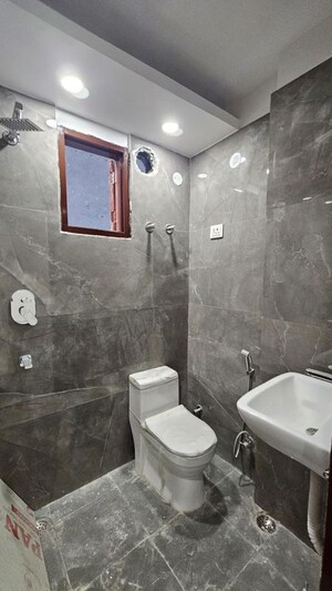 Bathroom in 2 BHK Builder Floor at Freedom Fighters Enclave – for Rent