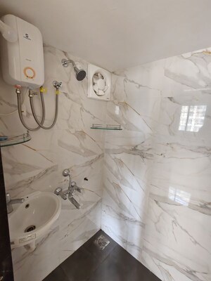 Bathroom in 1 BHK Apartment at Aanand Jai Bhavani CHS LTD SRA Project, Pokhran Road No Two – for Rent