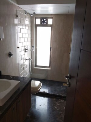 Bathroom in 2 BHK Apartment at Mangal Darshan Apartment, Bandra West – for Rent