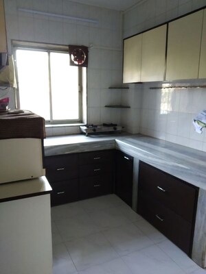 Kitchen in 2 BHK Apartment at Mangal Darshan Apartment, Bandra West – for Rent