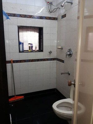 Bathroom in 2 BHK Apartment at Mangal Darshan Apartment, Bandra West – for Rent