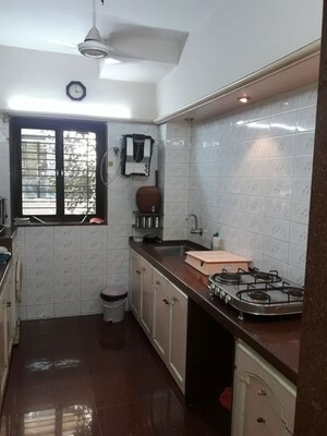 Kitchen in 2 BHK Apartment at Mangal Darshan Apartment, Bandra West – for Rent