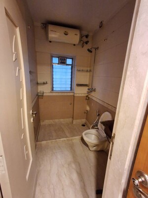 Bathroom in 2 BHK Apartment at Mangal Darshan Apartment, Bandra West – for Rent