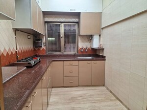 Kitchen in 2 BHK Apartment at Mangal Darshan Apartment, Bandra West – for Rent