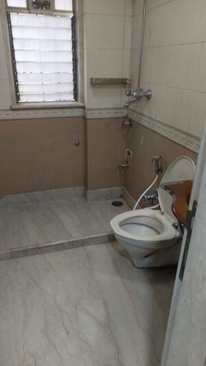 Bathroom in 2 BHK Apartment at Mangal Darshan Apartment, Bandra West – for Rent