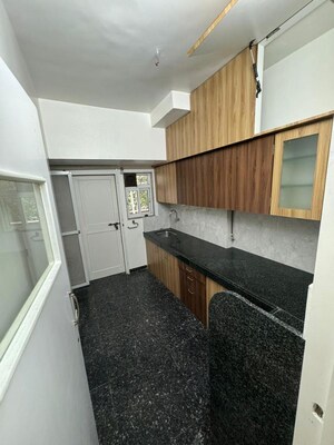 Kitchen in 2 BHK Apartment at Mangal Darshan Apartment, Bandra West – for Rent
