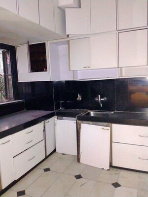 Kitchen in 2 BHK Apartment at Mangal Darshan Apartment, Bandra West – for Rent