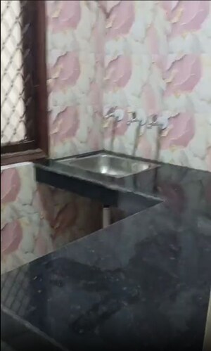 Kitchen in 1 BHK Builder Floor at Khirki Extension – for Sale