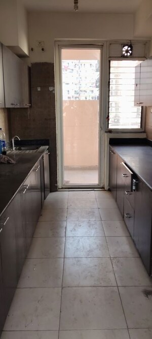 Kitchen in 3 BHK Apartment at Puri Pranayam, Sector 82 – for Sale