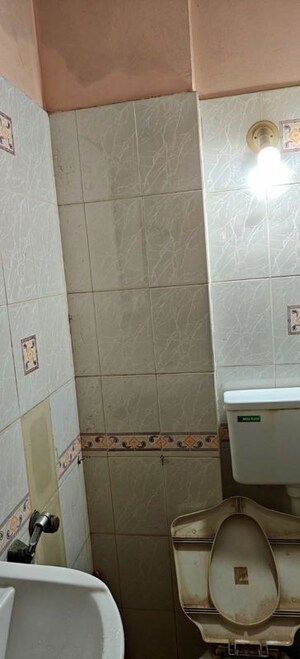 Bathroom in 2 BHK Apartment at Azad Apartment, Andheri West – for Rent