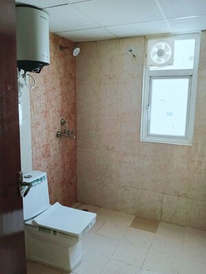 Bathroom in 2 BHK Apartment at Amrapali Hanging Gardens, Sector 107 – for Rent