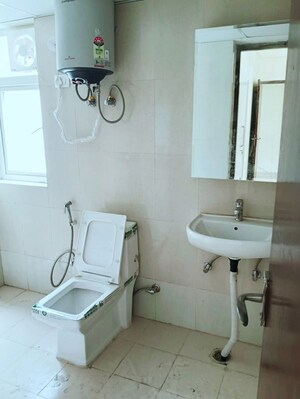 Bathroom in 2 BHK Apartment at Amrapali Hanging Gardens, Sector 107 – for Rent