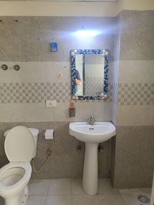 Bathroom in 2.5 BHK Apartment at Galaxy Royale, Gaur City 2 – for Rent