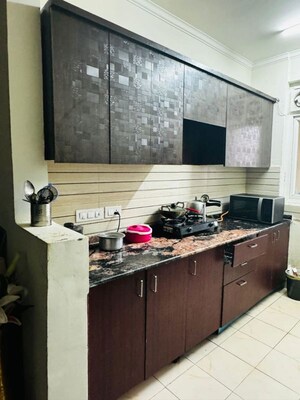 Kitchen in 3.5 BHK Apartment at Amrapali Silicon City, Sector 76 – for Sale
