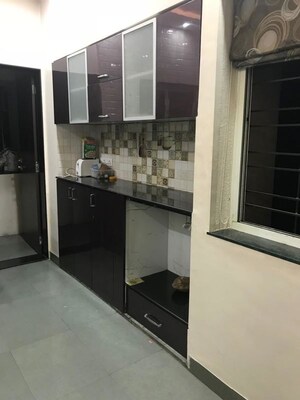 Kitchen in 2 BHK Apartment at Damodar Villa, Kothrud – for Rent