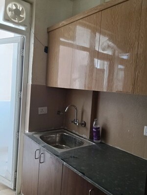 Kitchen in 2.5 BHK Apartment at Amrapali Hanging Gardens, Sector 107 – for Rent