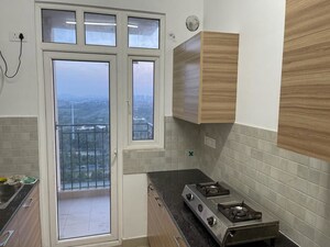 Kitchen in 2 BHK Apartment at ATS Happy Trails, Sector 10 Greater Noida – for Rent