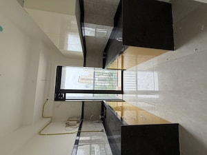 Kitchen in 2 BHK Apartment at Dhamji Shamji Mahavir Spring Tulip Phase 1, Pokhran Road No Two – for Rent