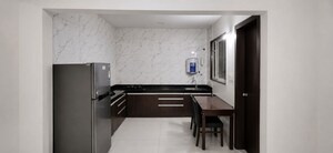 Kitchen in 3 BHK Apartment at GK Rose County, Pimple Saudagar – for Rent