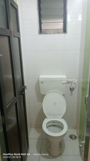 Bathroom in 2 BHK Apartment at Mayflower Apartment Kamothe, Kamothe – for Sale