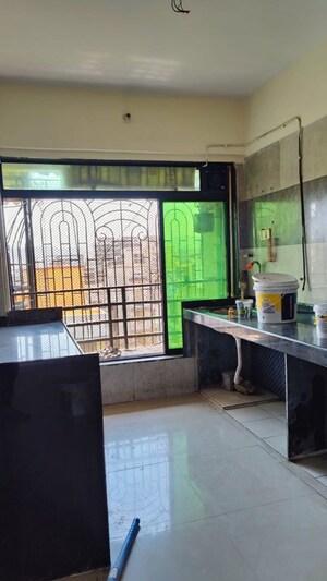 Kitchen in 2 BHK Apartment at Mayflower Apartment Kamothe, Kamothe – for Sale