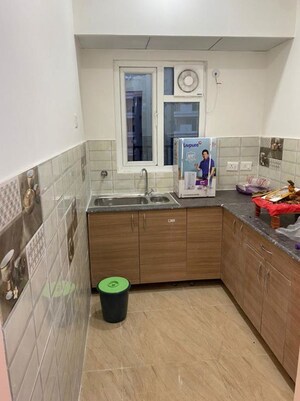 Kitchen in 2 BHK Apartment at Gaur City 2 - 14th Avenue, Sector 16c Greater Noida – for Rent